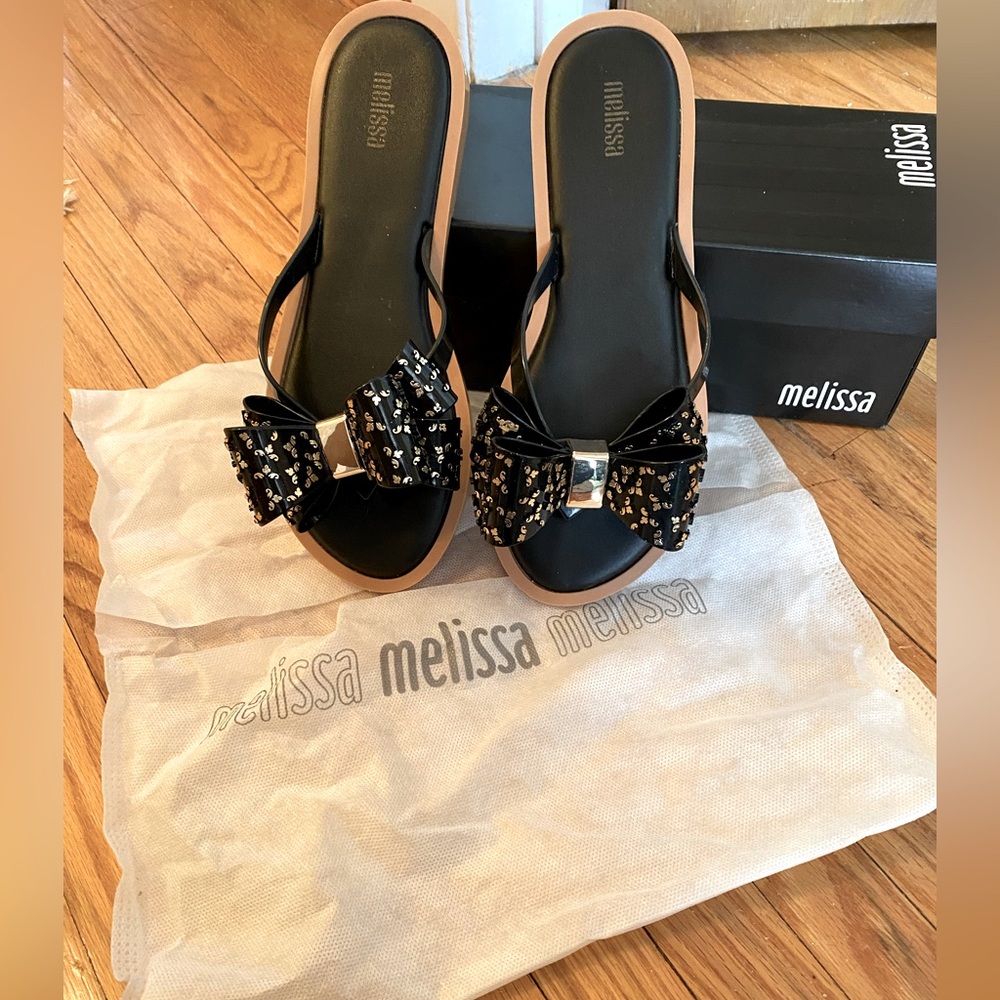 Melissa black and gold flip flops size 7 EUC